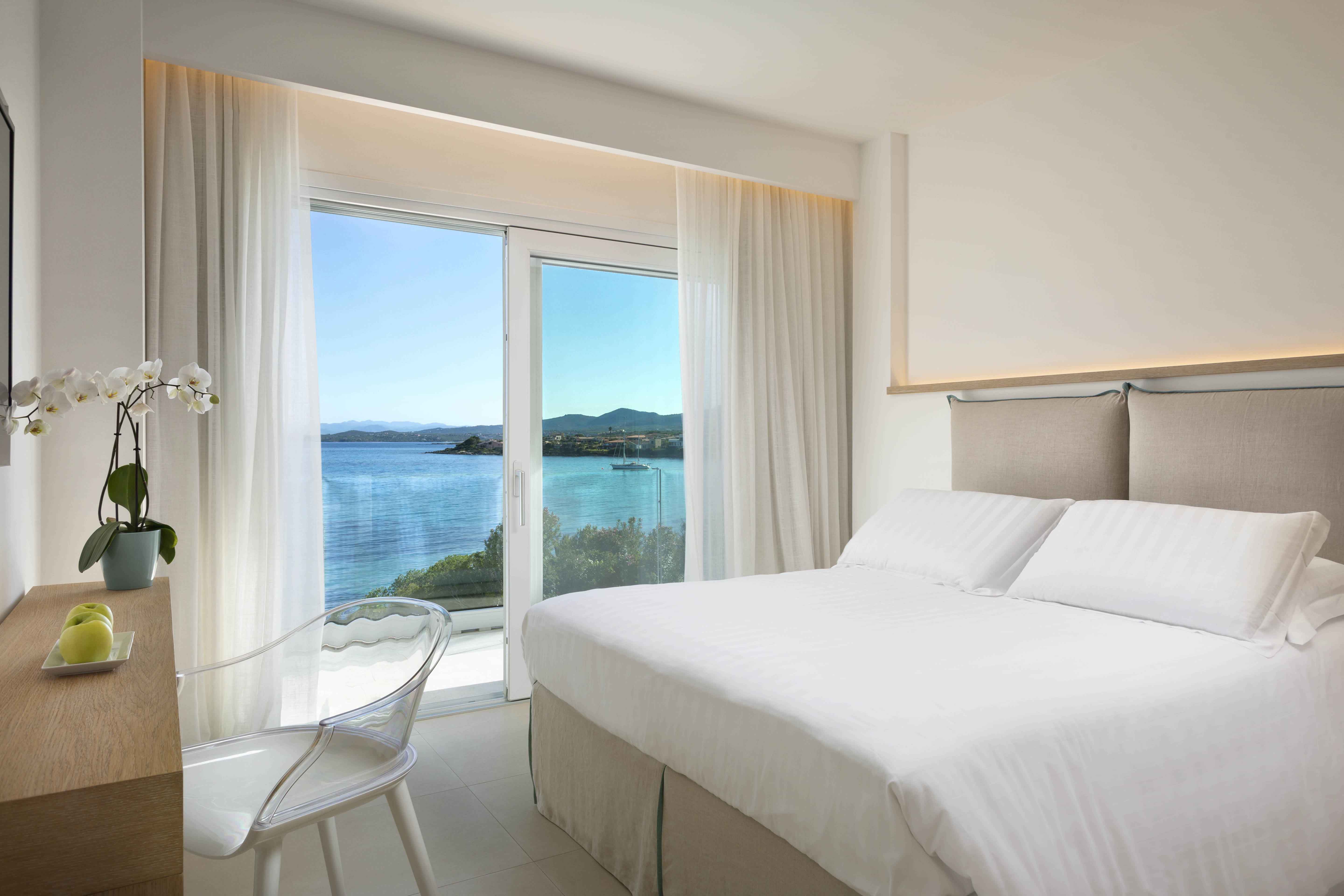 Suite Gabbiano Azzurro Sardinia bedroom Luxury Pool
